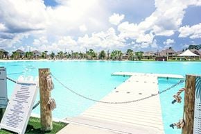 Atascocita townhouse for rent - A pool with a sign on the side.