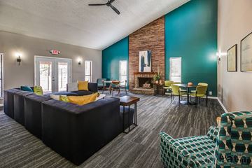 Huber Heights apartment for rent - a living room with a couch and chairs and a fireplace