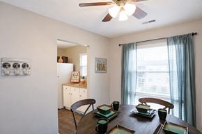 Cincinnati apartment for rent - A dining room with a table set for two.