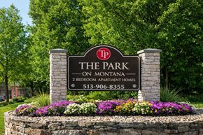 Cincinnati apartment for rent - A sign for The Park on Montana, a 2 bedroom apartment complex, with a phone number listed.