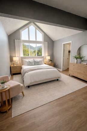 Huber Heights apartment for rent - A bedroom with a large bed, a window with a view of trees, and a wooden nightstand with a plant on top.