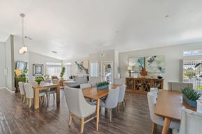 Pittsburg apartment for rent - A dining room with a long table and chairs.