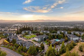 Happy Valley apartment for rent - an aerial view of a neighborhood with houses and trees