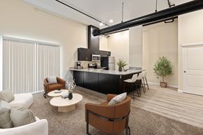 Fairfield apartment for rent - A modern living room with a kitchen area in the background.