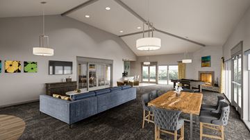 Rohnert Park apartment for rent - A modern living room with a grey sofa and a wooden table.