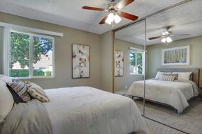 Sparks apartment for rent - a bedroom with two beds and a ceiling fan