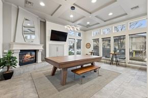 Antioch apartment for rent - A modern dining room with a wooden table and bench.