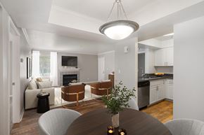Livermore apartment for rent - A modern kitchen with a dining table and chairs.