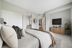 Laguna Niguel apartment for rent - A bedroom with a bed, a dresser, and a mirror.