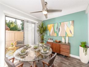 Alta Loma apartment for rent - A dining room with a glass table and chairs.