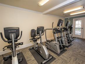 Martinez apartment for rent - A gym with a variety of exercise equipment including treadmills, stationary bikes, and elliptical machines.
