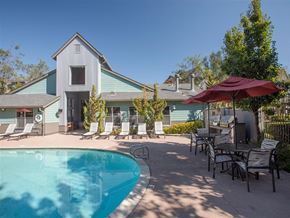 Petaluma apartment for rent - A pool and patio area in front of a house.