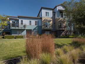 Petaluma apartment for rent - A modern apartment complex with a grassy front yard.
