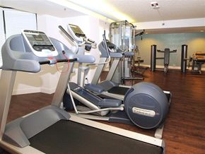 San Francisco apartment for rent - A gym with treadmills, elliptical machines, and weights.
