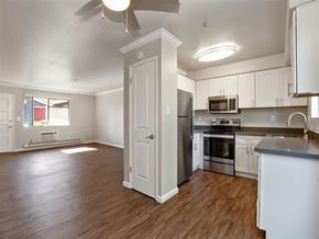 Santa Rosa apartment for rent - A kitchen with a refrigerator, oven, and microwave.