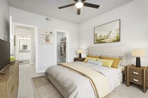 Aliso Viejo apartment for rent - A bedroom with a large bed and a ceiling fan.