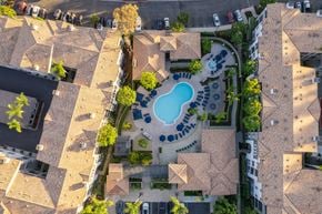 Aliso Viejo apartment for rent - A bird's eye view of a residential area with a swimming pool.