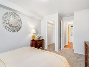 Happy Valley apartment for rent - A bedroom with a bed, dresser, and mirror.