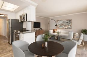 Martinez apartment for rent - A modern kitchen with a dining table and chairs.