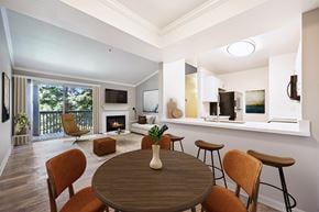 Livermore apartment for rent - A modern dining room with a wooden table and chairs.
