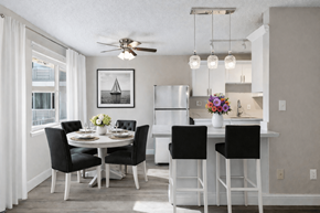 San Leandro apartment for rent - A dining room with a table set for four.