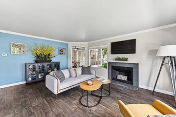 Laguna Niguel apartment for rent - A living room with a grey sofa and a coffee table.