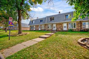 Maplewood townhouse for rent - a house with a yard and a no parking sign