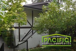 Ashland apartment for rent - the front of a building with a pacific rental properties sign