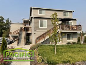 Medford apartment for rent - a house with stairs and a yard with a tree