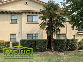 Medford apartment for rent - a building with a palm tree in front of it