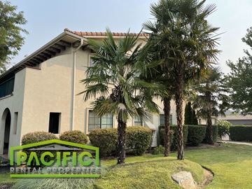 Medford apartment for rent - a building with palm trees in front of it