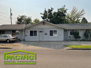 Medford apartment for rent - a white house with a car parked in front of it