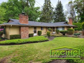Medford apartment for rent - a yellow house with a brick chimney on the front
