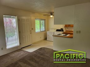 Medford apartment for rent - the interior of an empty living room with a kitchen