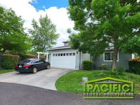 Medford apartment for rent - a car parked in a driveway in front of a house