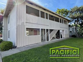 Medford apartment for rent - a white house with a lawn in front of it