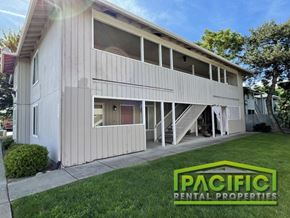 Medford apartment for rent - a white house with a lawn in front of it