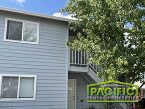 Medford apartment for rent - a house with a pacific rental properties sign in front of it