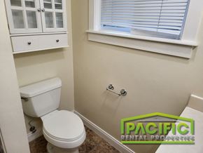 Ashland apartment for rent - a small bathroom with a toilet and a window