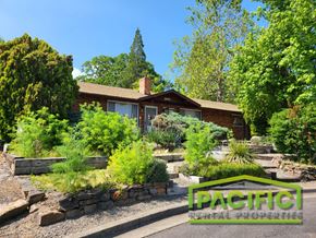 Ashland apartment for rent - a home with a garden in front of it
