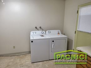 Ashland apartment for rent - a laundry room with a washer and dryer in it