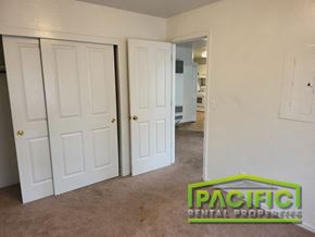 Ashland apartment for rent - a bedroom with two closets and a carpeted floor