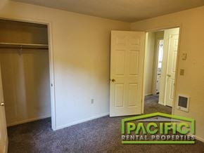 Ashland apartment for rent - a bedroom with a closet and a door to a closet