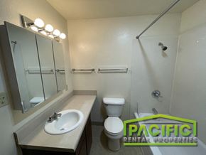 Ashland apartment for rent - a bathroom with a sink and a toilet and a shower