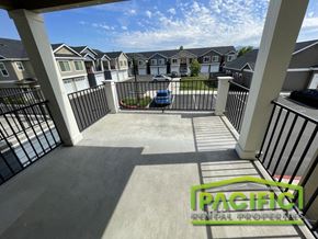 Medford apartment for rent - a view from the deck of a home with a car parked on it