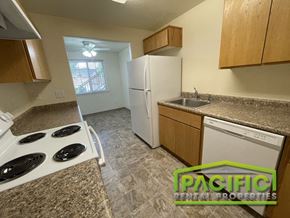 Central Point apartment for rent - a kitchen with a stove refrigerator and a sink