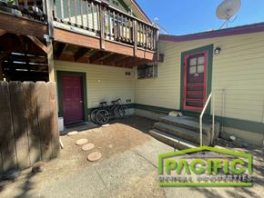 Ashland apartment for rent - the front of a house with a porch and a staircase