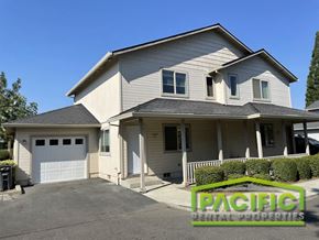 Medford apartment for rent - a tan and with a white garage door