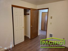Ashland apartment for rent - a bedroom with a closet and an open door
