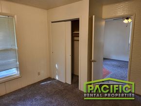 Ashland apartment for rent - a bedroom with a closet and a door to a bathroom
